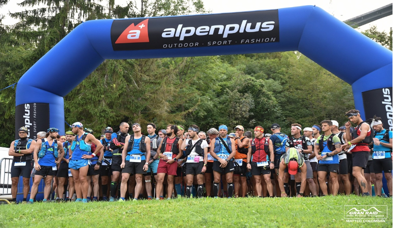 trail runners lining up for race start Grand Raid of the Treviso Alps