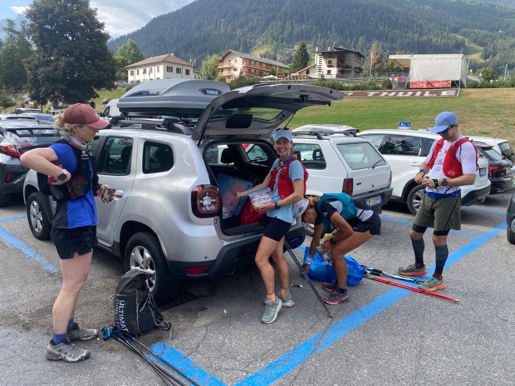 Trail Runners change equipment during the Tor des Geants